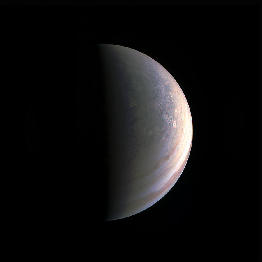 NASA Juno's spacecraft takes a picture while approaching Jupiter's North Pole