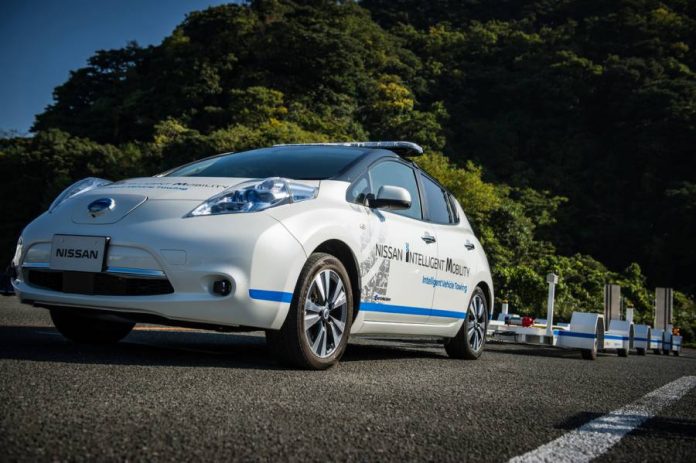 nissan-uses-self-driving-towing-cars-at-oppama-plant Nissan uses self driving towing cars at Oppama Plant.