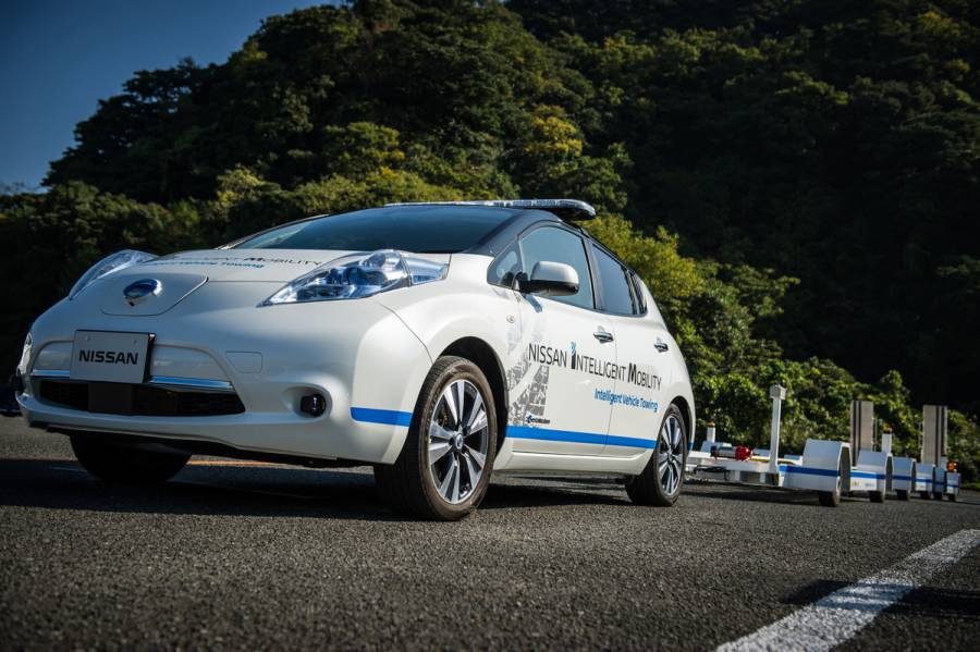 Nissan uses self driving towing cars at Oppama Plant.