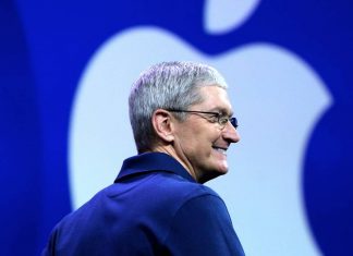Tim Cook-smiling-Apple logo
