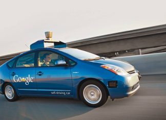 Blue Google autonomous car on the highway