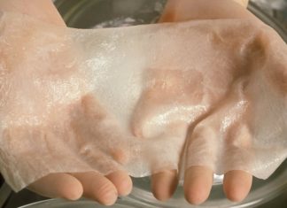 Oxford researchers aim to create robots to grow human skin scientists-hands-hold-artificial-skin-825x550