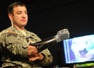 Smart gadgets improve the life of U.S. Veterans nowadays US Army-Medal of Honor Hero with prothesis