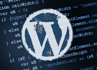 WordPress Logo on top of a sheet of code.