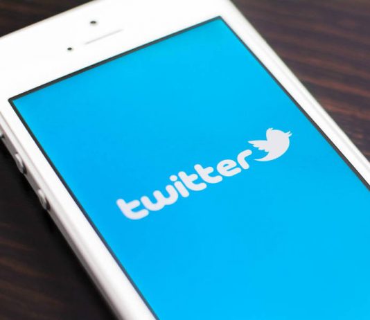 Smartphone with Twitter on the screen