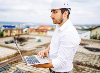 Beginner’s Guide to Home Construction Project Management Software Construction-Worker-Planning