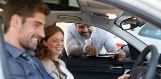 Couple Buying New Car
