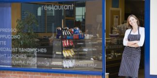 Woman Small Business Owner Standing by the Door