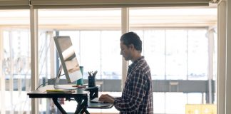 Employee Working on Standing Desk